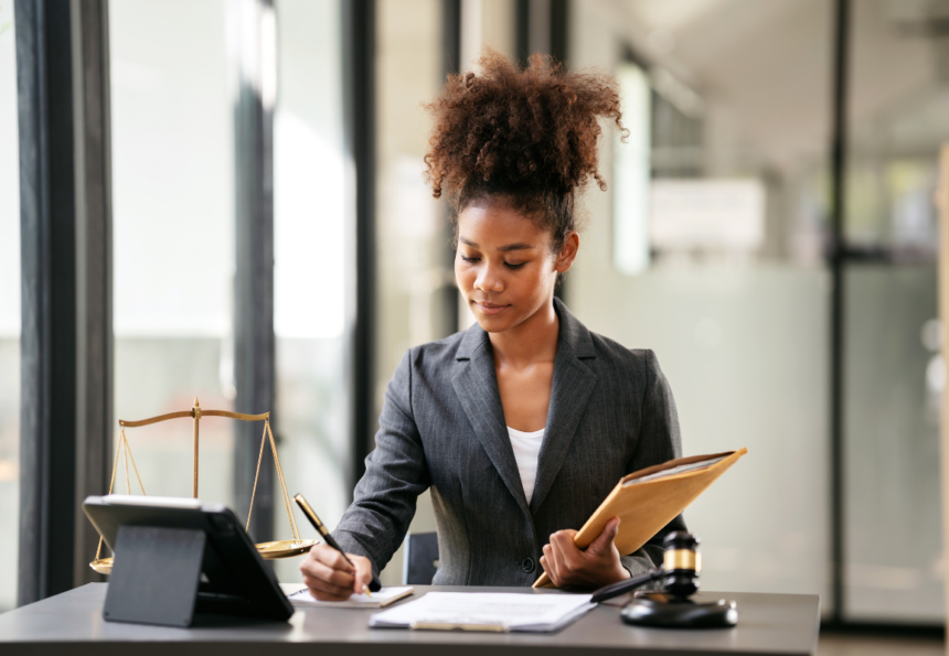 Female lawyer holding a business envelope